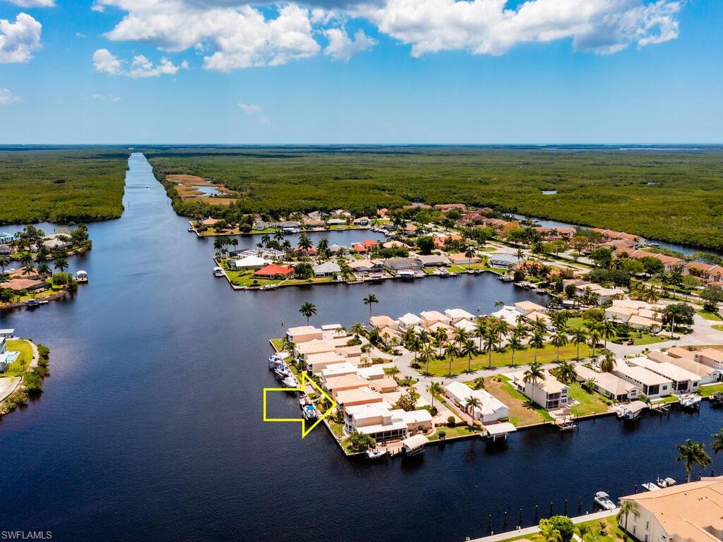 172 Eveningstar Cay Naples, FL 34114 - Photo 24 of 24 an aerial view of a ocean beach