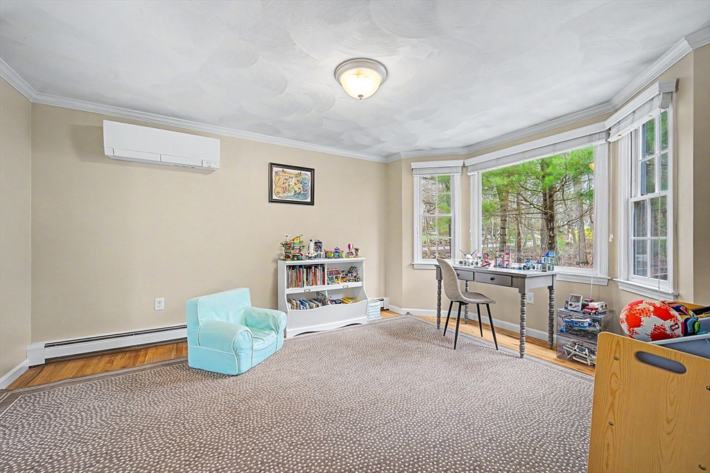 1 Coburn Road Hopkinton, MA 01748 - Photo 14 of 42 a view of a livingroom with furniture and a window