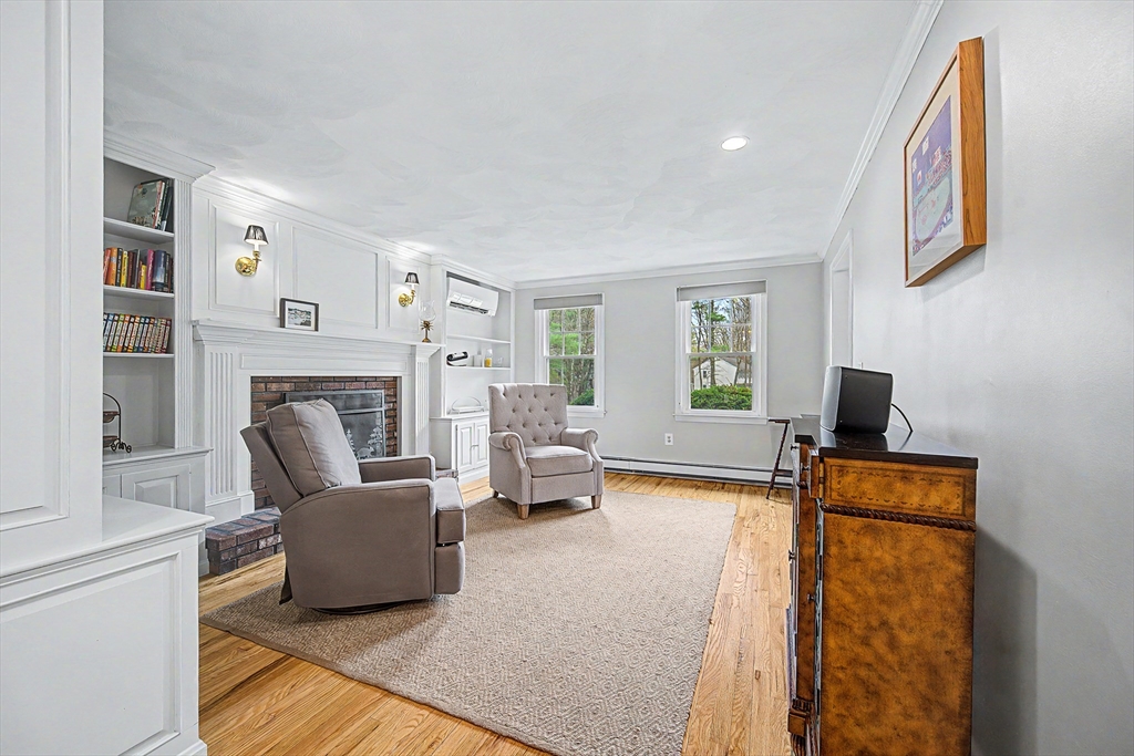 1 Coburn Road Hopkinton, MA 01748 - Photo 17 of 42 a living room with furniture and a fireplace