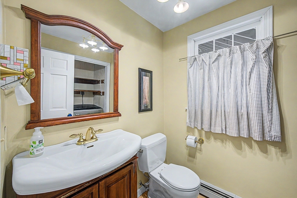 1 Coburn Road Hopkinton, MA 01748 - Photo 18 of 42 a bathroom with a sink toilet and shower