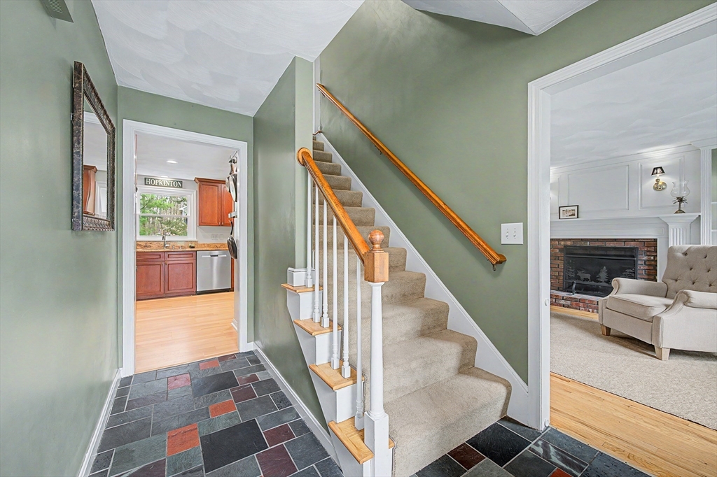 1 Coburn Road Hopkinton, MA 01748 - Photo 19 of 42 a view of entryway and hall with wooden floor