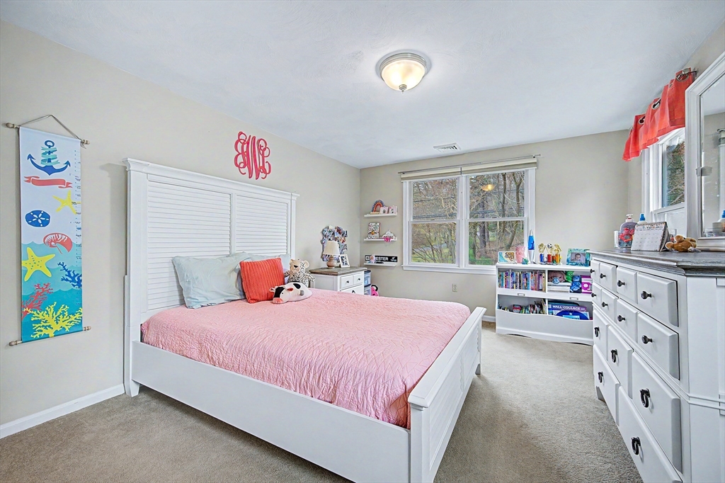 1 Coburn Road Hopkinton, MA 01748 - Photo 20 of 42 a bedroom with a bed and a window