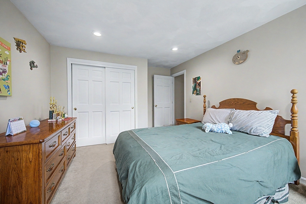 1 Coburn Road Hopkinton, MA 01748 - Photo 25 of 42 a bedroom with a bed and a window