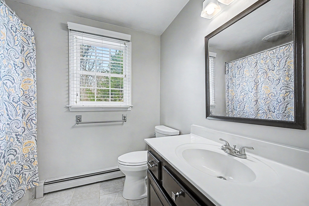 1 Coburn Road Hopkinton, MA 01748 - Photo 26 of 42 a bathroom with a sink toilet and vanity