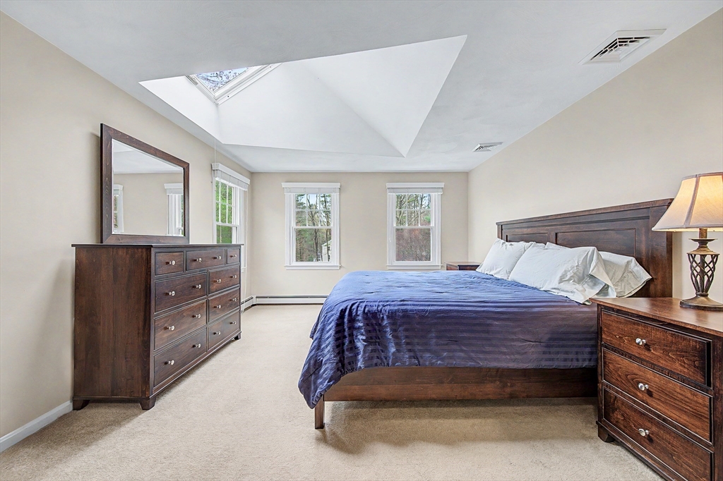 1 Coburn Road Hopkinton, MA 01748 - Photo 28 of 42 a bedroom with a bed and a dresser