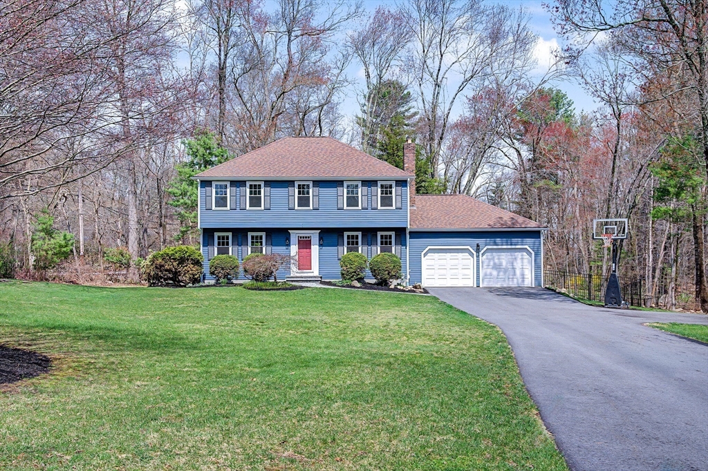 1 Coburn Road Hopkinton, MA 01748 - Photo 41 of 42 a front view of a house with garden