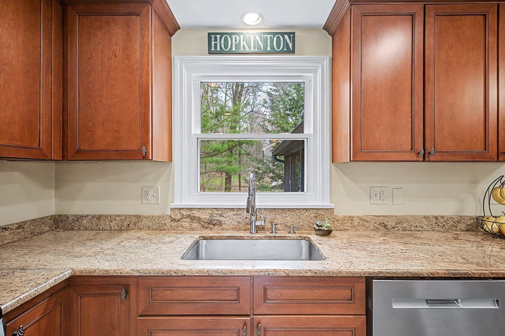 1 Coburn Road Hopkinton, MA 01748 - Photo 5 of 42 a kitchen with granite countertop stainless steel appliances a sink window and cabinets