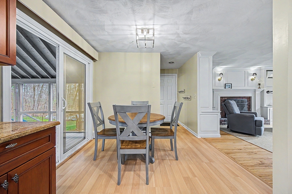 1 Coburn Road Hopkinton, MA 01748 - Photo 9 of 42 a dining room with furniture and wooden floor