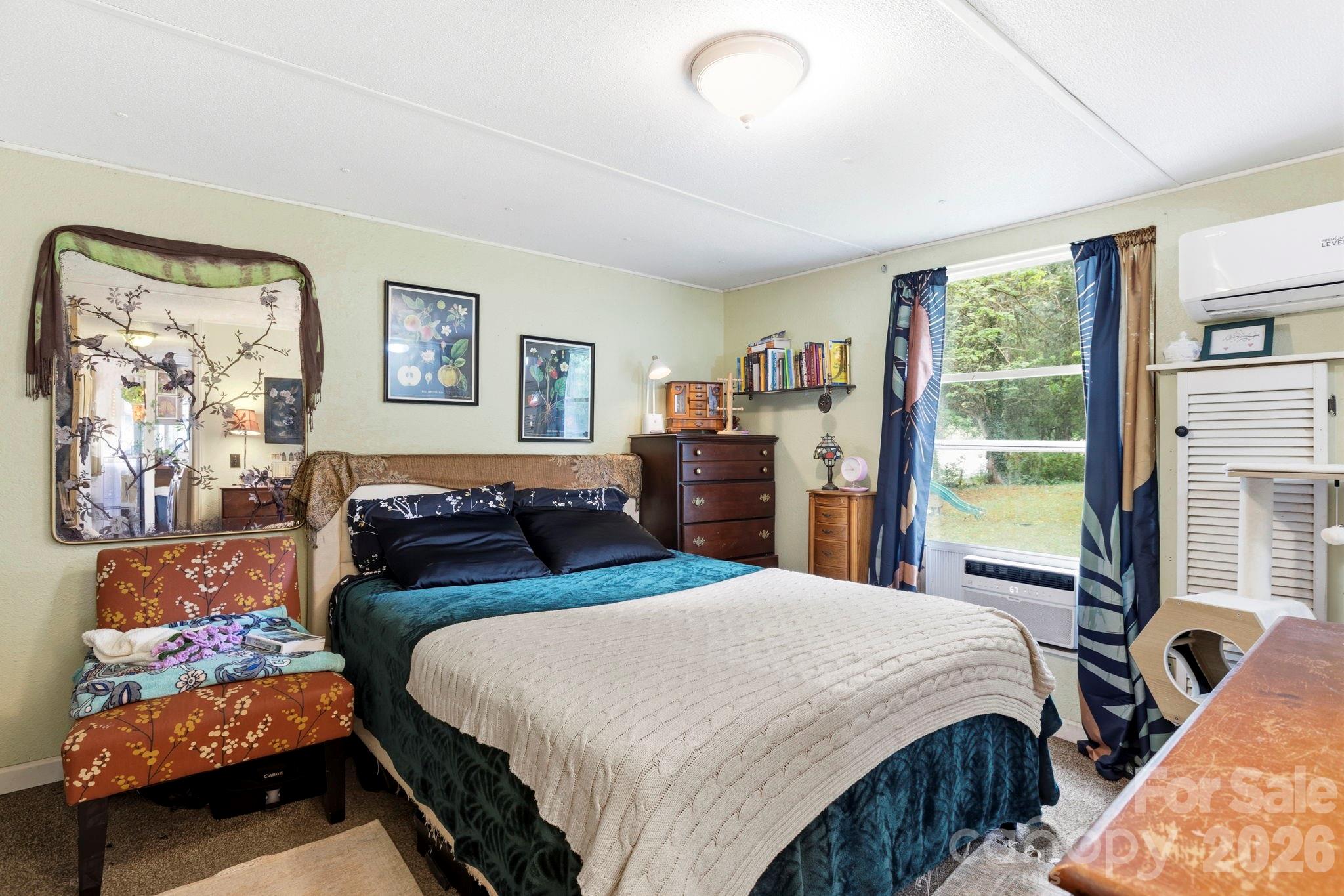4 Mountain View Road Asheville, NC 28806 - Photo 23 of 35 a bedroom with beds and a large window