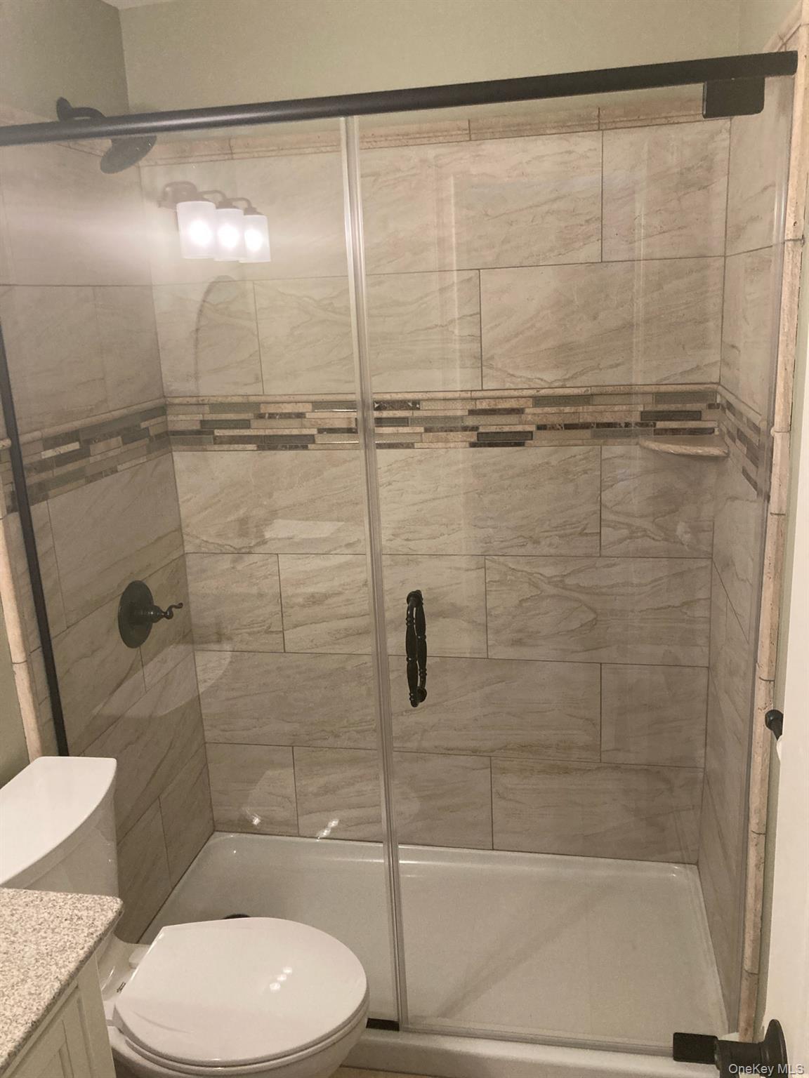 2 Colonial Road, Unit 126 Beacon, NY 12508 - Photo 9 of 11 Bathroom with vanity and a stall shower
