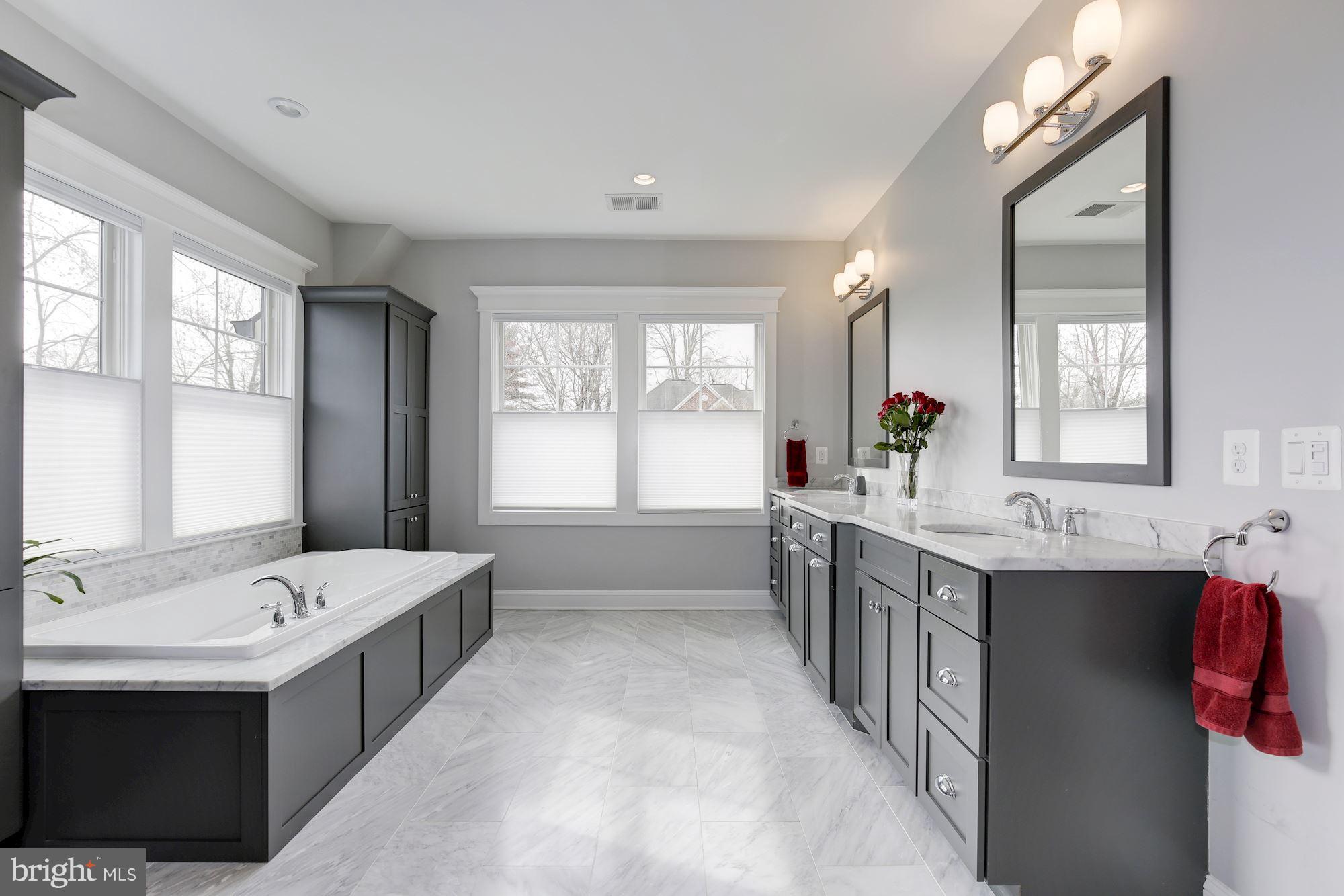 7200 Matthew Mills Road McLean, VA 22101 - Photo 16 of 30 Carrera marble throughout w/ soaking tub to unwind