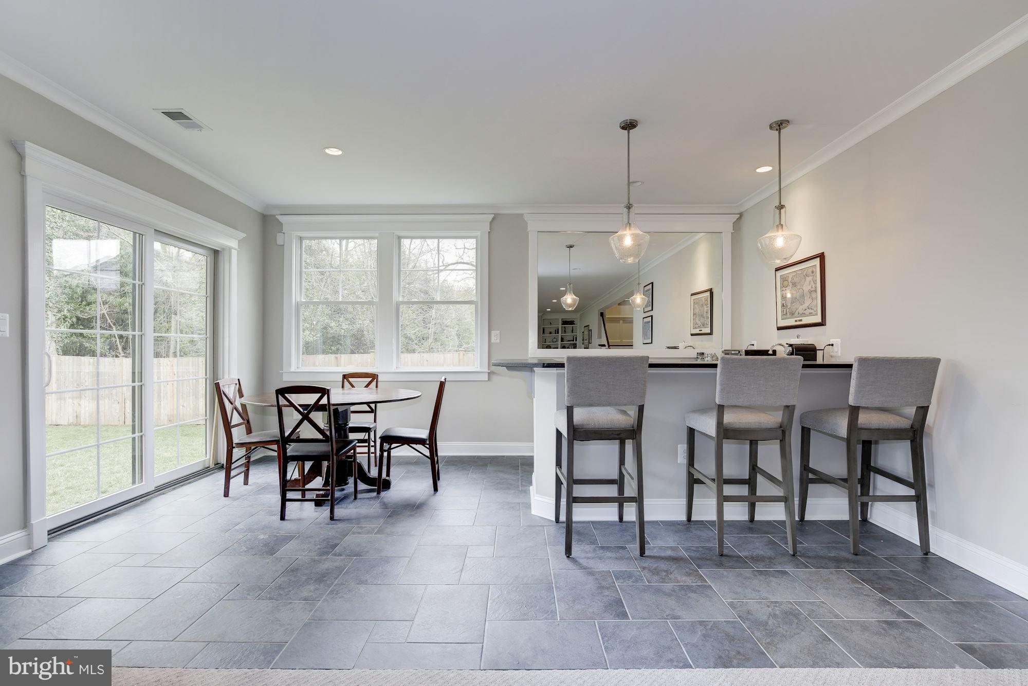 7200 Matthew Mills Road McLean, VA 22101 - Photo 25 of 30 Basement walk-out provides plenty of light for bar
