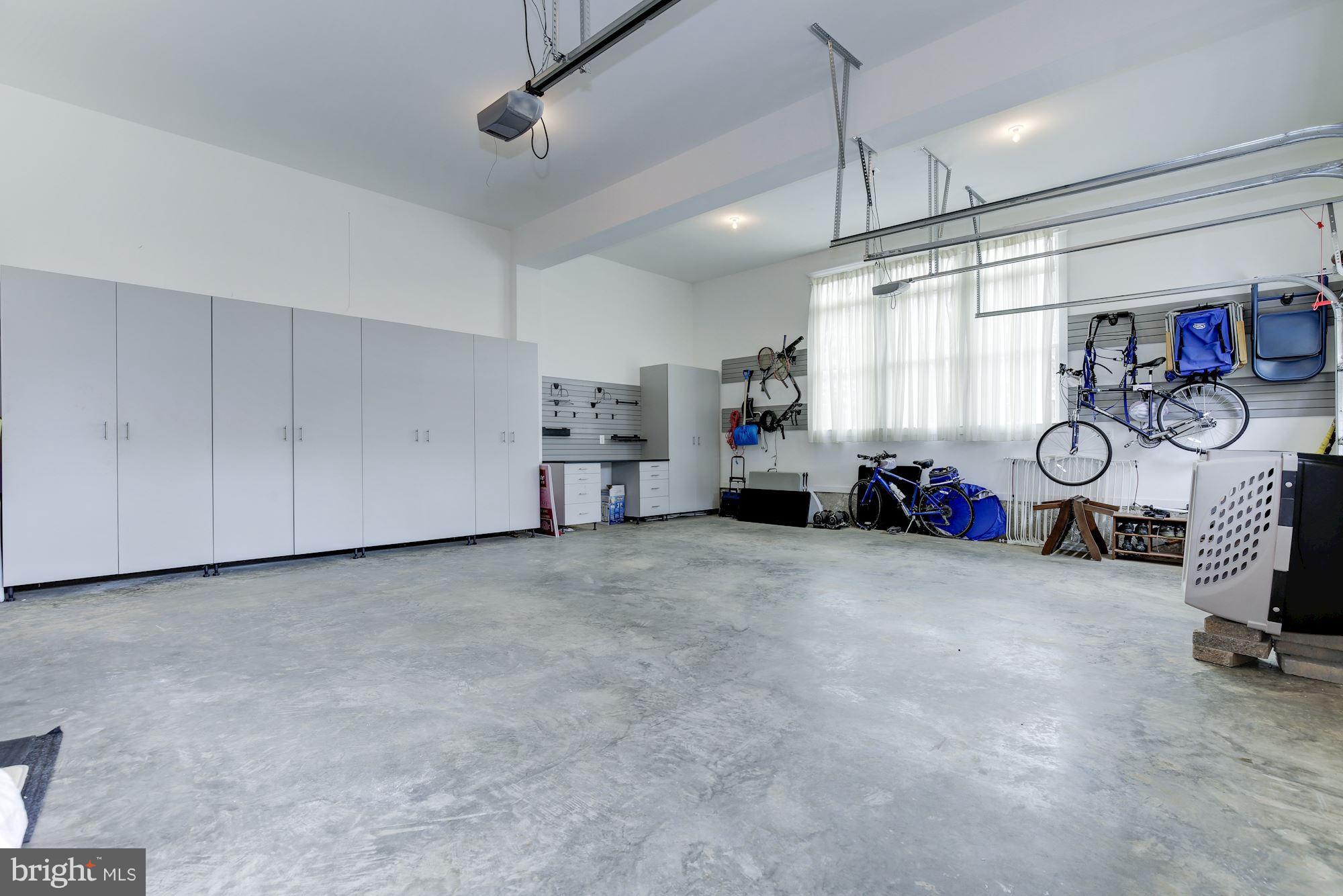 7200 Matthew Mills Road McLean, VA 22101 - Photo 29 of 30 3car garage with 13' ceilings and built-in storage