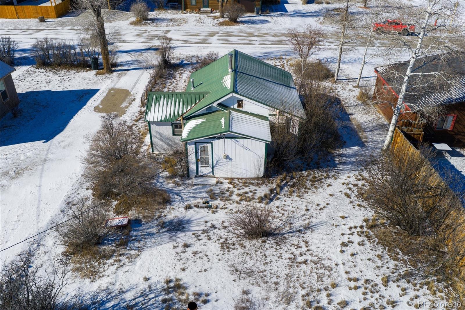 212 5th Street Kremmling, CO 80459 - Photo 2 of 10 a view of a house with a yard