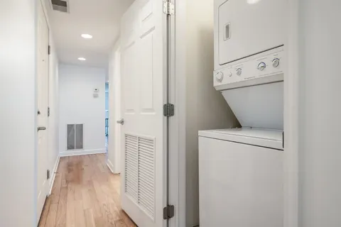a view of bathroom with a washer and dryer