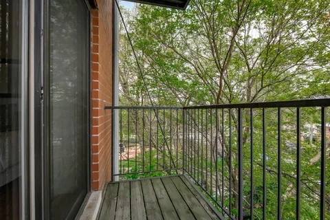 a view of a balcony with lake view