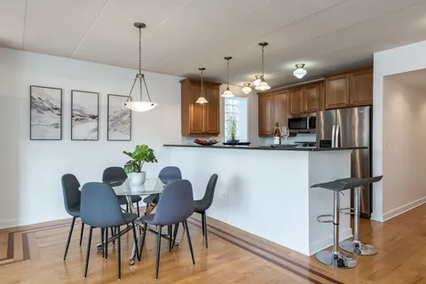 a view of a dining room with furniture
