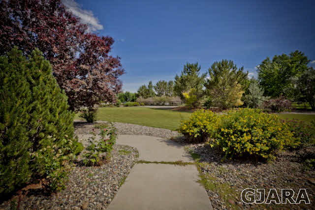 2334 Sundial Road Grand Junction, CO 81505 - Photo 28 of 31 a view of a pathway with a yard