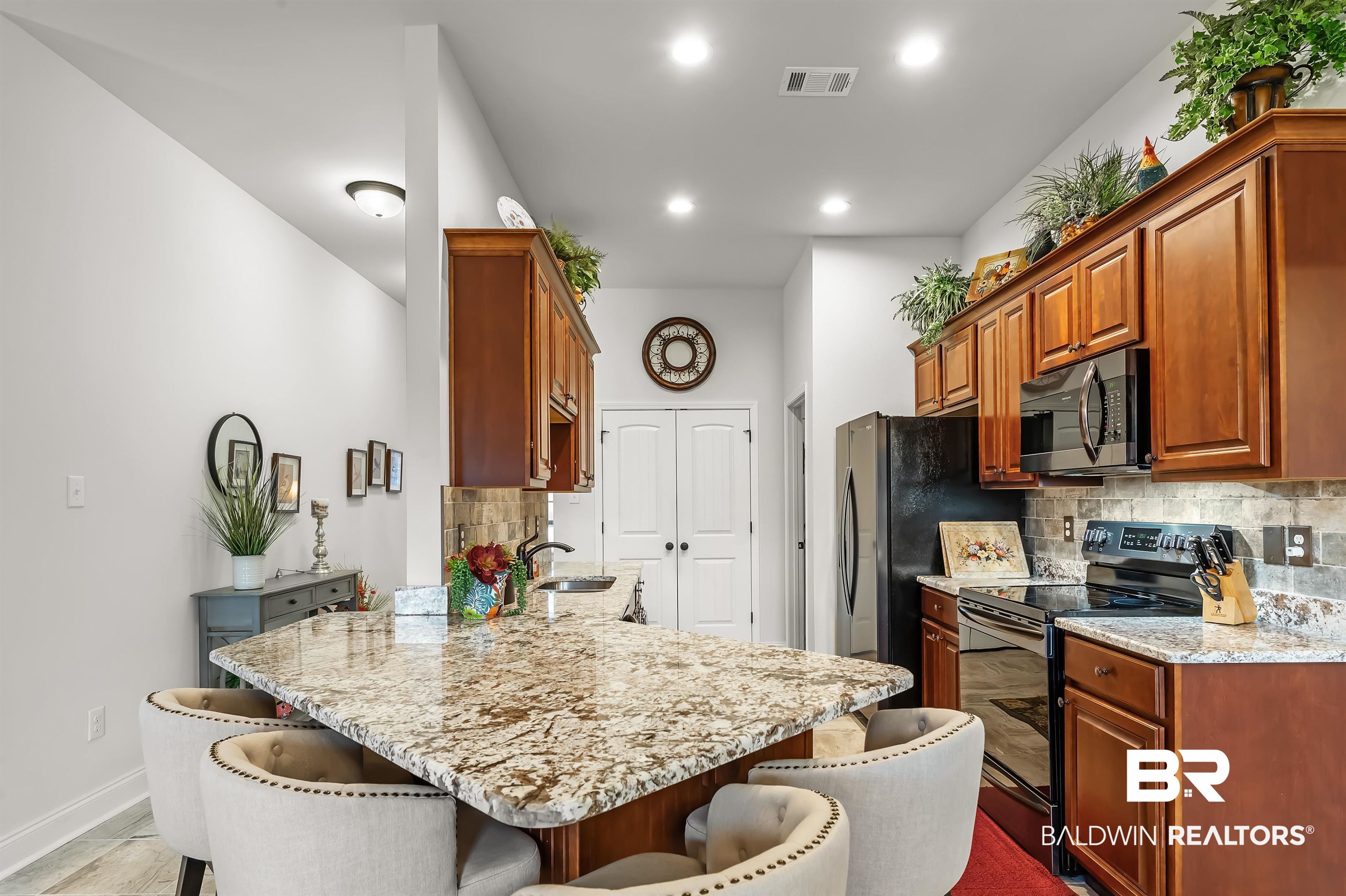 1271 Surrey Loop Foley, AL 36535 - Photo 13 of 23 Awesome Granite countertops and stylish kitchen