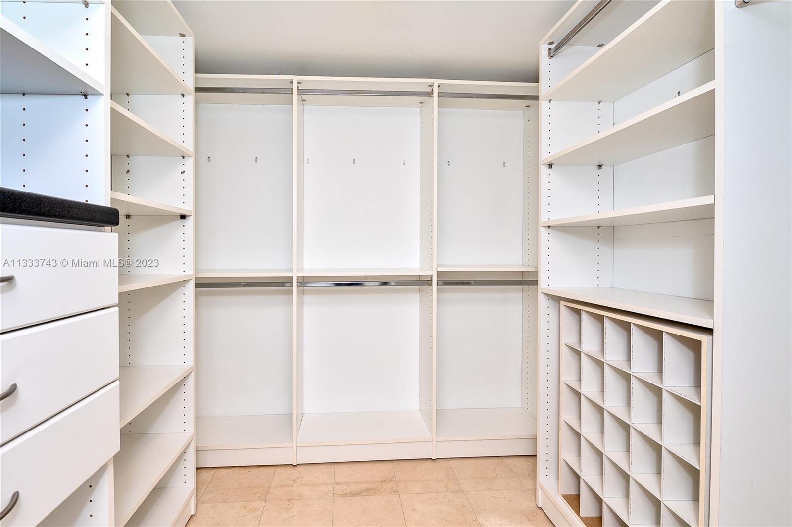 Brickell Miami, FL 33129 - Photo 11 of 44 a view of walk in closet with empty racks
