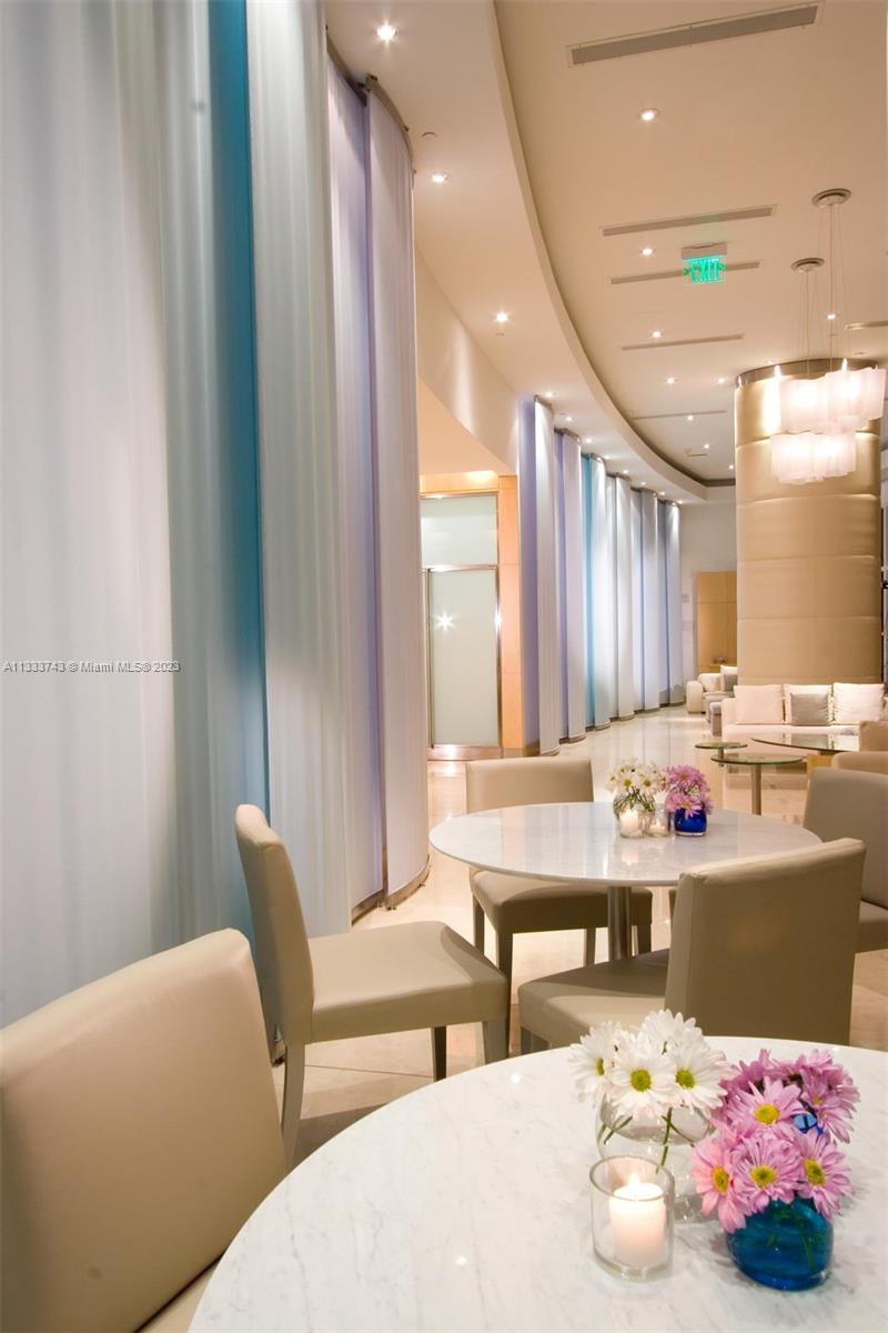 Brickell Miami, FL 33129 - Photo 37 of 44 a room with furniture and window