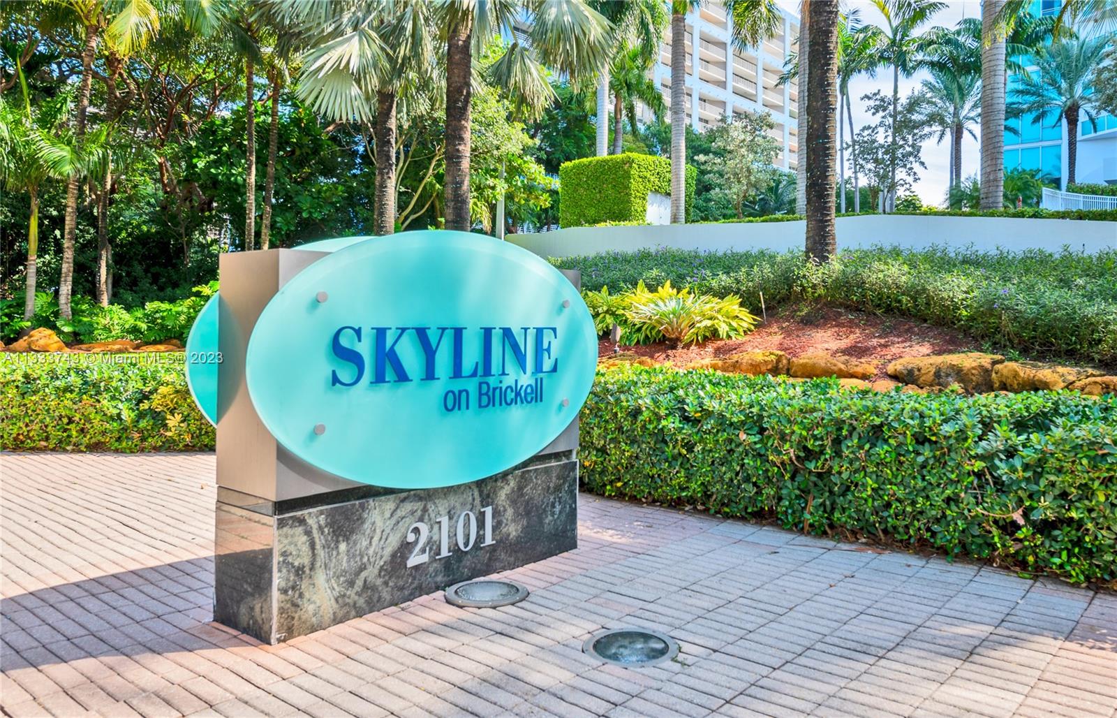 Brickell Miami, FL 33129 - Photo 40 of 44 a view of a wooden dinning table and chairs in patio