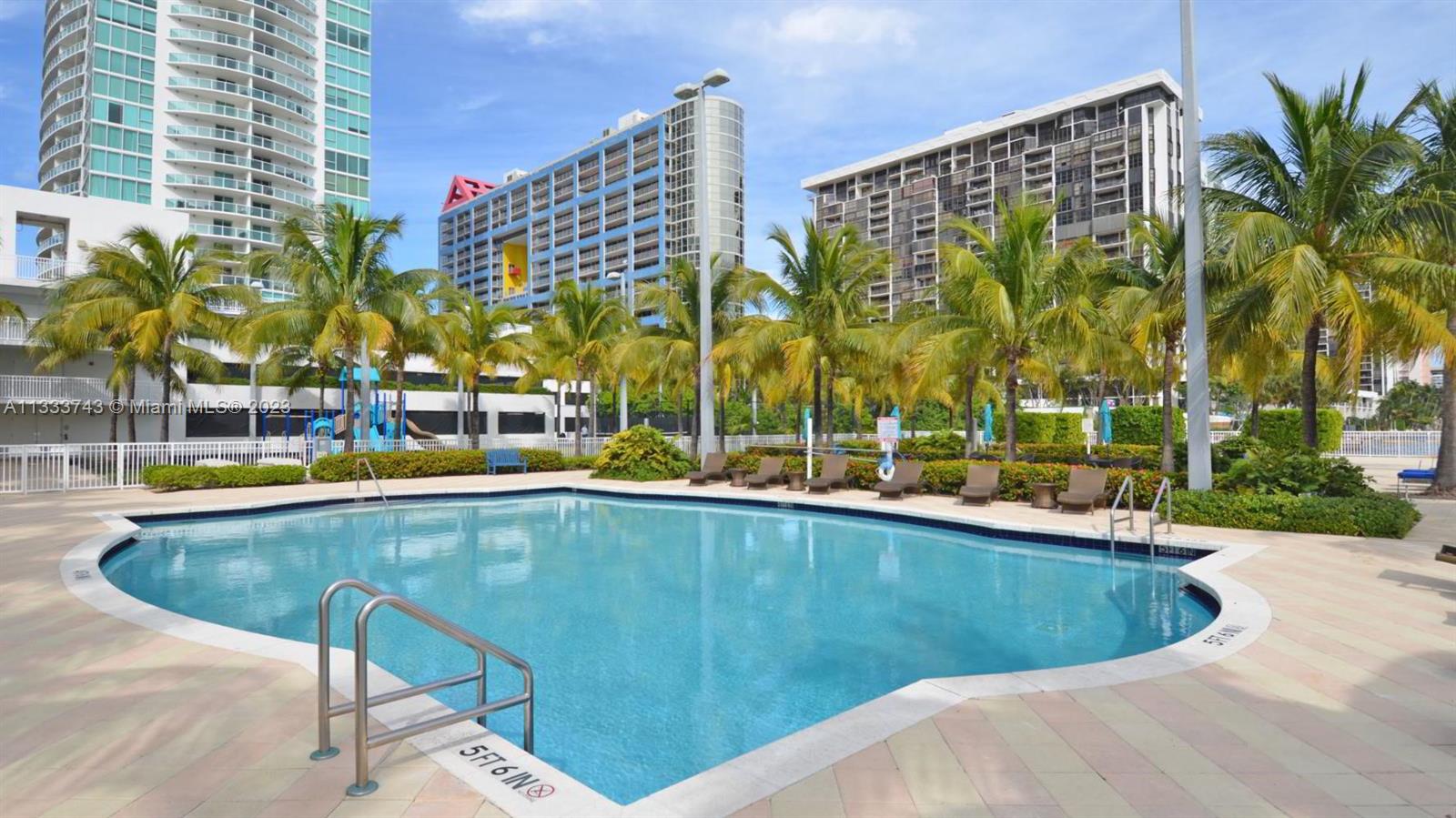 Brickell Miami, FL 33129 - Photo 44 of 44 a view of swimming pool with outdoor seating and city view