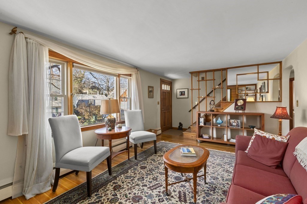 9 Lawrence Street Beverly, MA 01915 - Photo 15 of 42 a living room with furniture and a large window