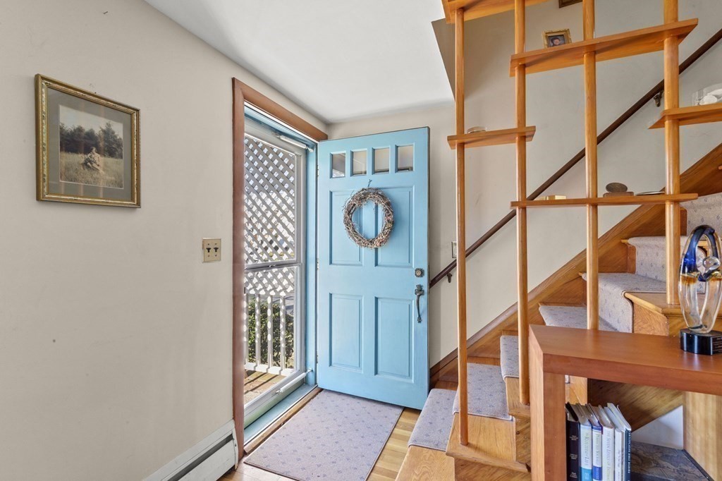 9 Lawrence Street Beverly, MA 01915 - Photo 3 of 42 a view of an entryway with staircase