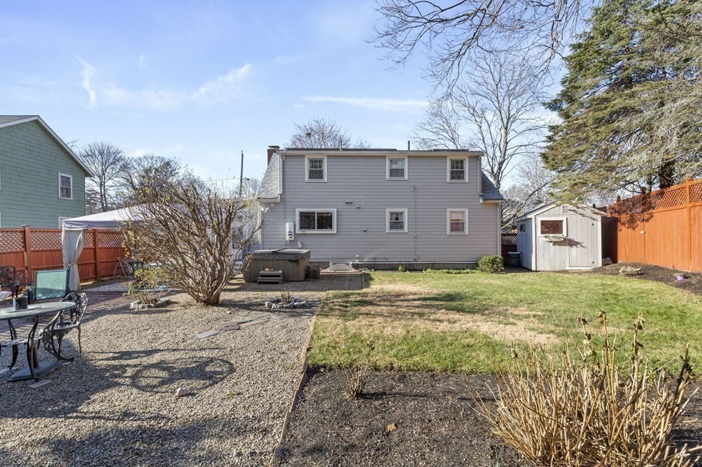 9 Lawrence Street Beverly, MA 01915 - Photo 33 of 42 a view of a house with a backyard