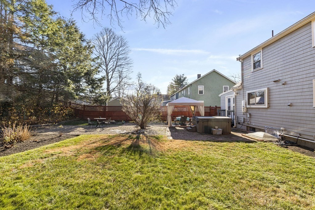 9 Lawrence Street Beverly, MA 01915 - Photo 35 of 42 a view of swimming pool with outdoor seating and house in the background