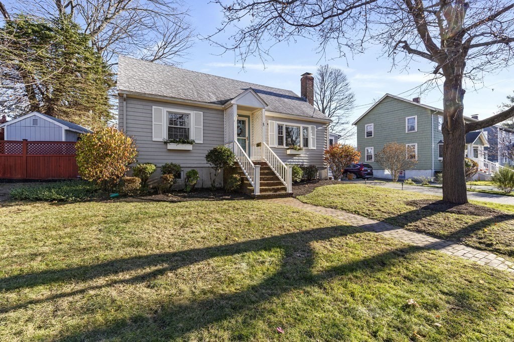 9 Lawrence Street Beverly, MA 01915 - Photo 37 of 42 a front view of a house with garden