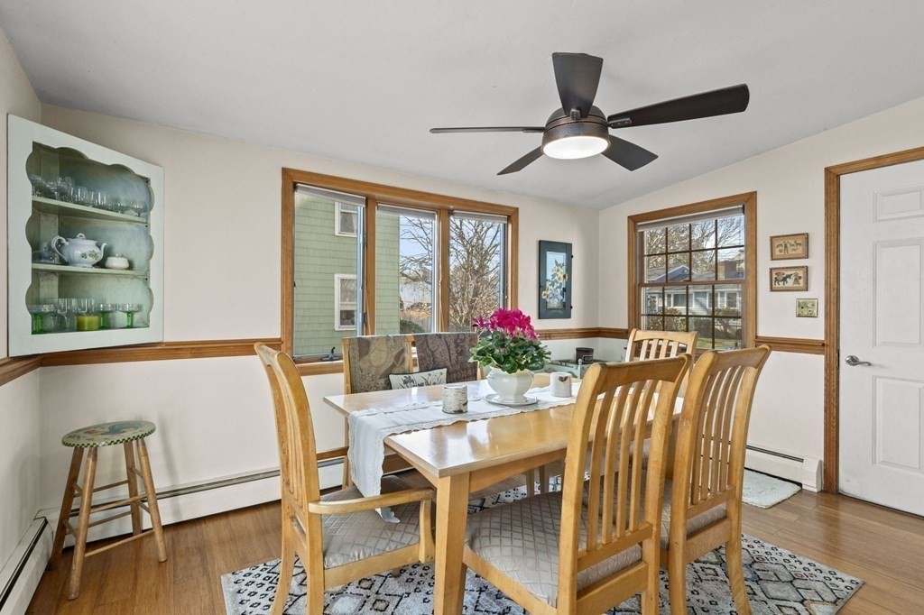 9 Lawrence Street Beverly, MA 01915 - Photo 7 of 42 a view of a dining room with furniture window and wooden floor