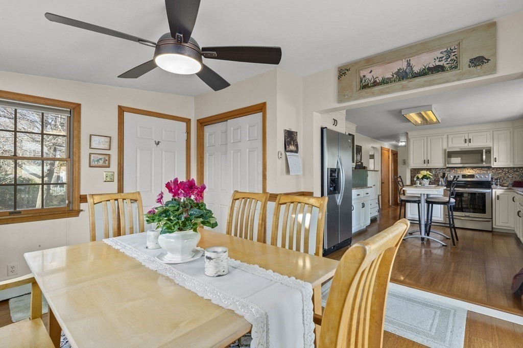 9 Lawrence Street Beverly, MA 01915 - Photo 8 of 42 a view of a dining room with furniture window and wooden floor