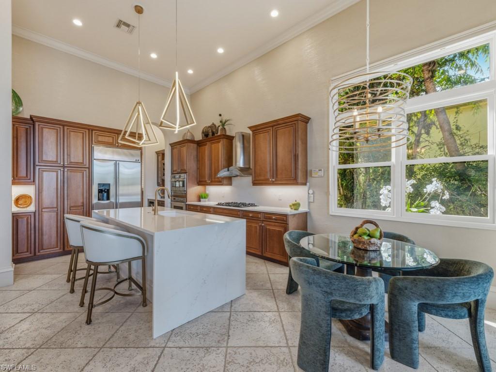 18112 Lagos Way Naples, FL 34110 - Photo 16 of 50 Kitchen w/ Breakfast Nook