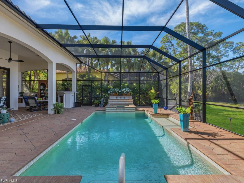 18112 Lagos Way Naples, FL 34110 - Photo 29 of 50 a view of yard with a slide