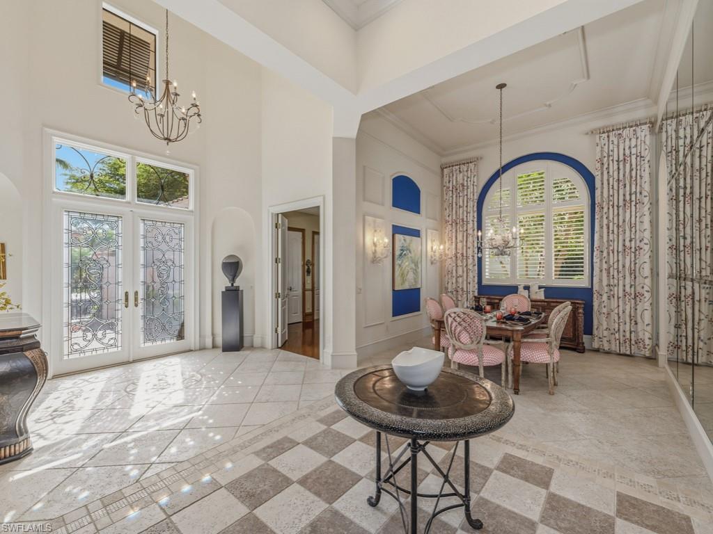 18112 Lagos Way Naples, FL 34110 - Photo 5 of 50 a view of a livingroom with furniture and window