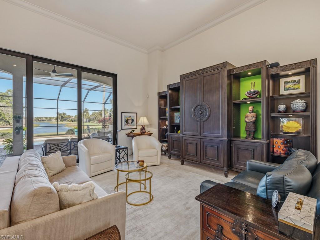 18112 Lagos Way Naples, FL 34110 - Photo 10 of 50 a living room with furniture and large window