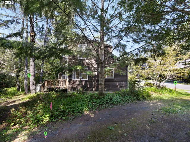 a backyard of a house with lots of green space