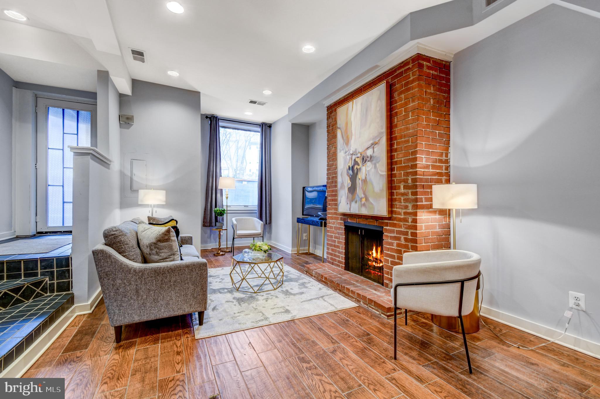1726 U Street Northwest, Unit 1 Washington, DC 20009 - Photo 6 of 31 Living Room w/ Fireplace