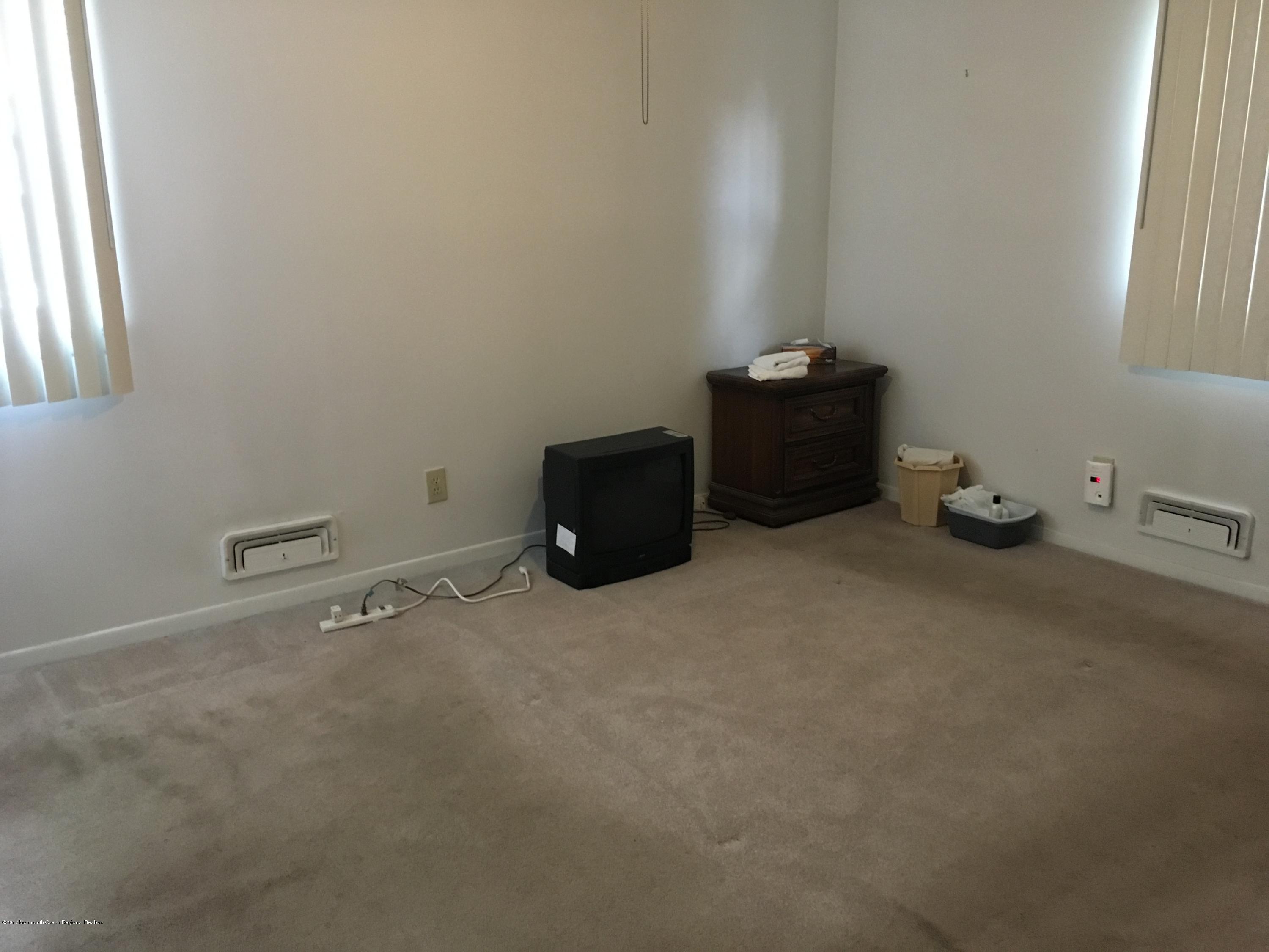 320 Eastham Road Point Pleasant, NJ 08742 - Photo 8 of 18 a room with a window