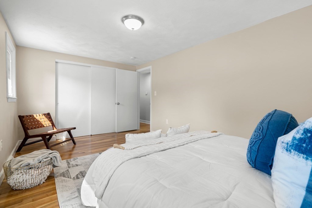 5 Shalloo Road Billerica, MA 01821 - Photo 23 of 42 a bedroom with a bed and chair