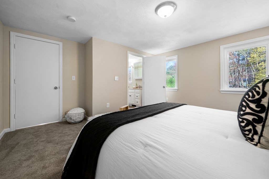 5 Shalloo Road Billerica, MA 01821 - Photo 25 of 42 a bedroom with a bed and a window