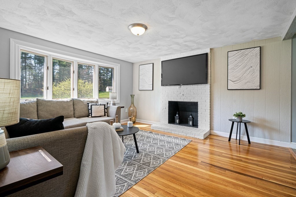 5 Shalloo Road Billerica, MA 01821 - Photo 4 of 42 a living room with furniture and a fireplace