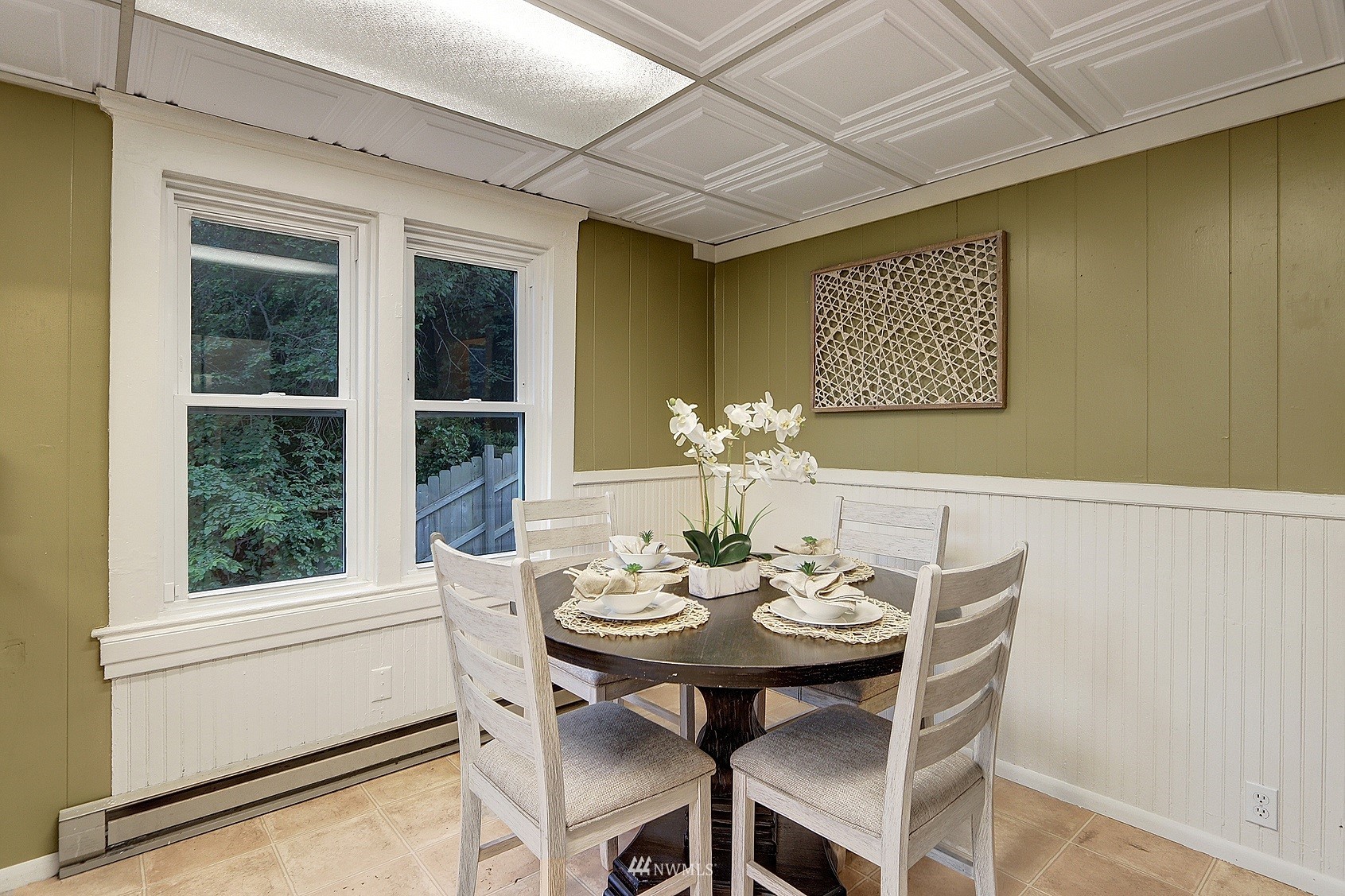 3927 Wetmore Avenue Everett, WA 98201 - Photo 15 of 26 a view of a dining room with furniture window and outside view