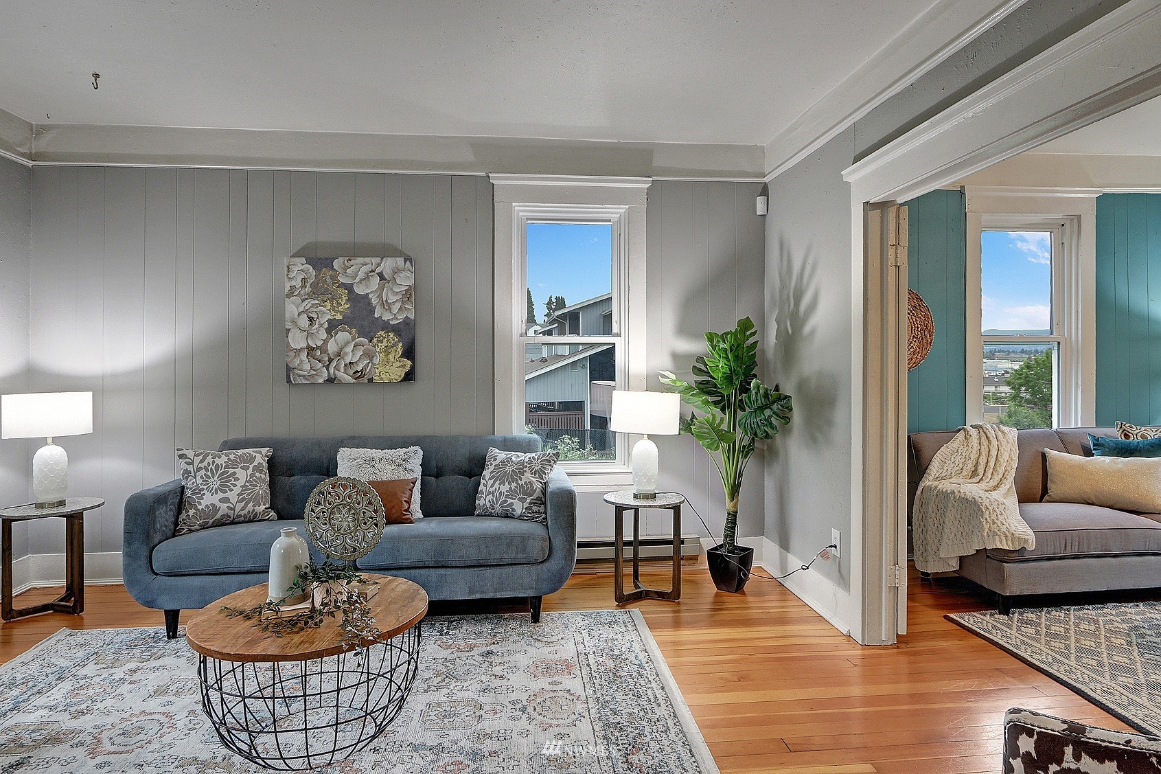 3927 Wetmore Avenue Everett, WA 98201 - Photo 4 of 26 a living room with furniture and a potted plant