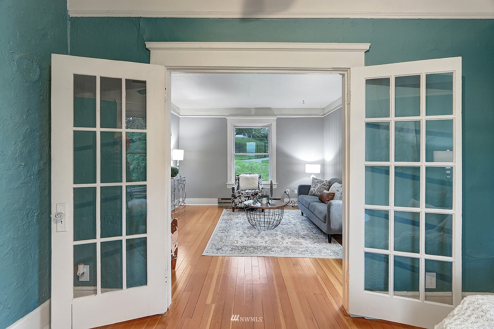 3927 Wetmore Avenue Everett, WA 98201 - Photo 10 of 26 a view of living room with windows and lounge chair