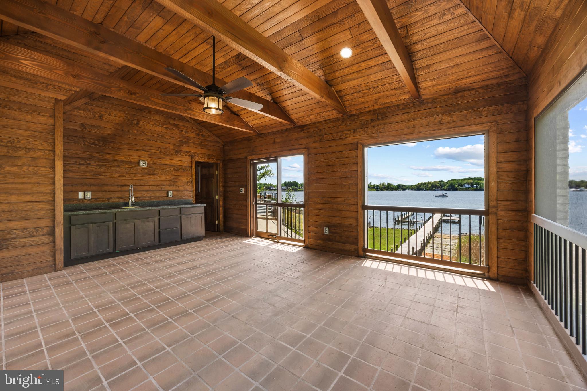 31 Shadow Point Court Edgewater, MD 21037 - Photo 32 of 44 Screened porch with wet bar