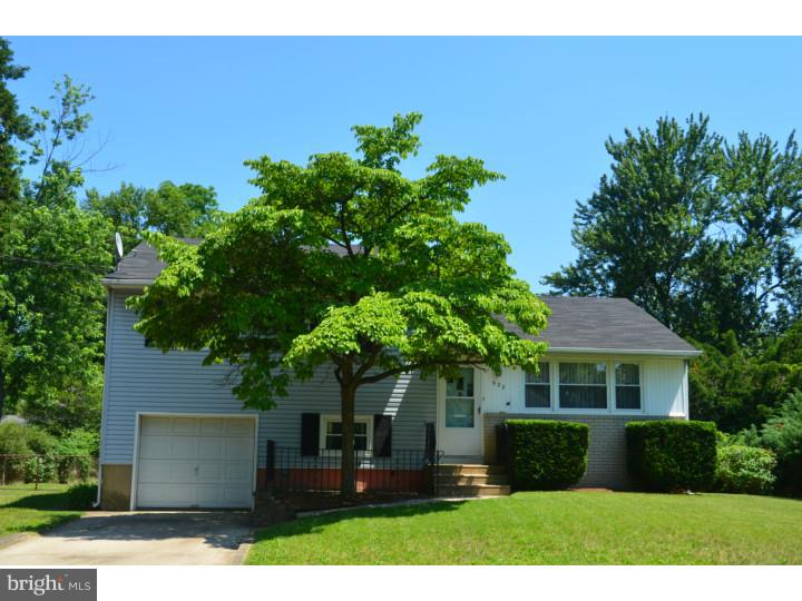 520 8 Street Riverside, NJ 08075 - Photo 1 of 14 a front view of a house with garden