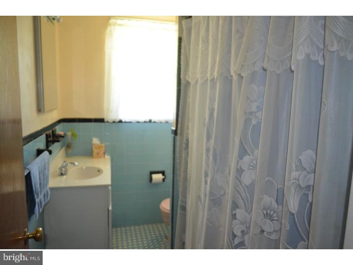 520 8 Street Riverside, NJ 08075 - Photo 12 of 14 a bathroom with a shower